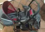 Cochecito de bebé 3 ruedas gris y rojo con burbuja de lluvia