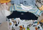 19 Camisetas para niño 12-18m, en muy buen estado.