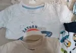19 Camisetas para niño 12-18m, en muy buen estado.