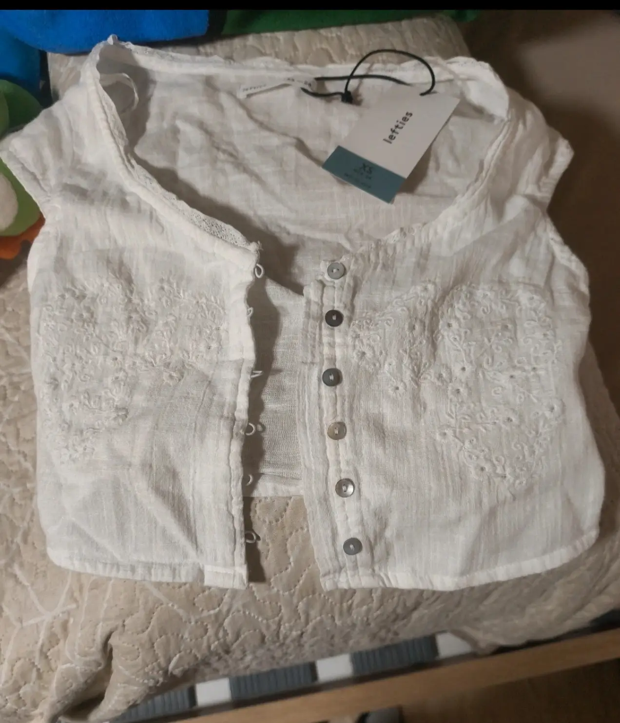 Top Leftis blanco