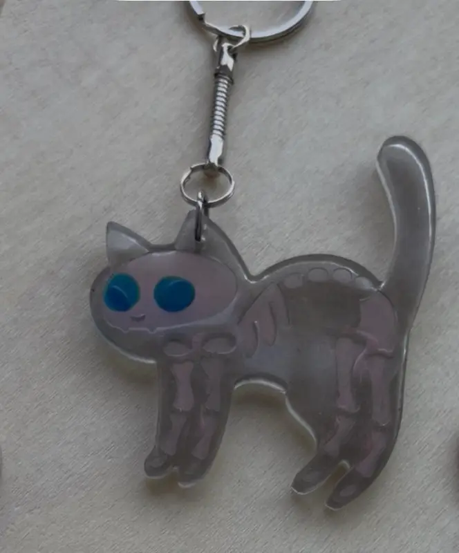 Llaveros gato esqueleto