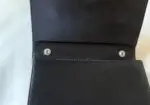Bolso negro de mano