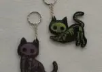 Llaveros gato esqueleto