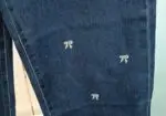 Pantalón vaquero con lazos