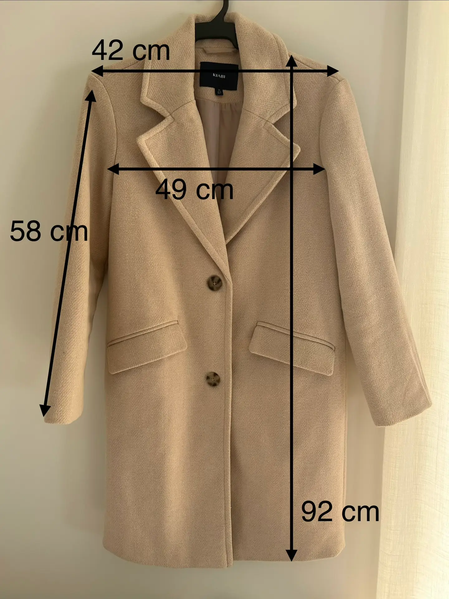 Abrigo crema sastre minimalista Kiabi talla 36