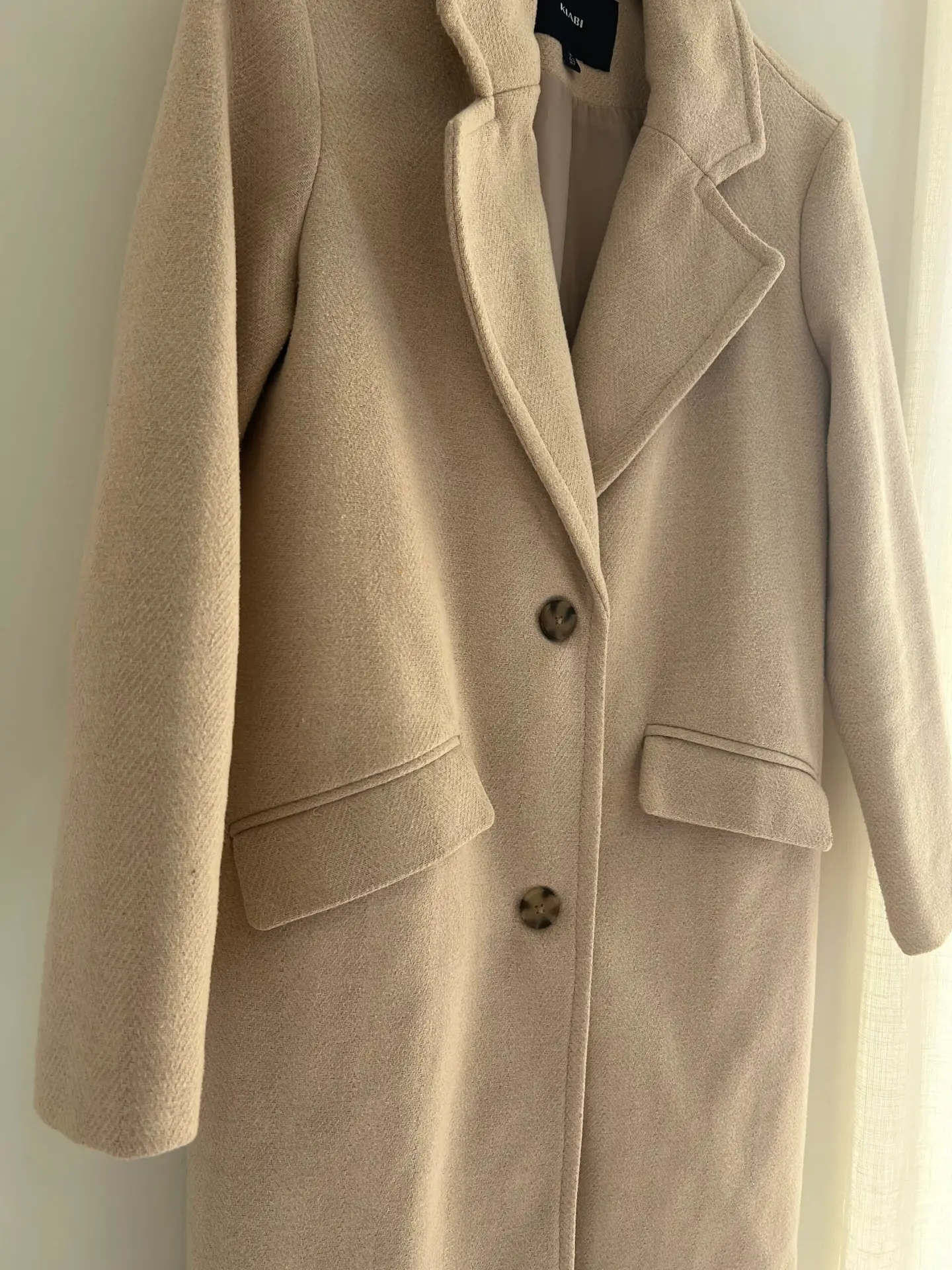 Abrigo crema sastre minimalista Kiabi talla 36